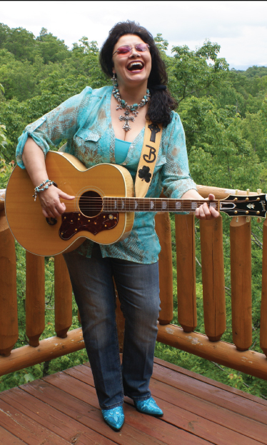 Bernadette playing guitar