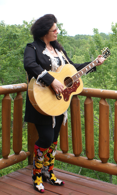 Bernadette playing guitar